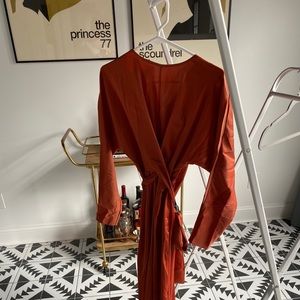 Floor length rust colored dress with tie